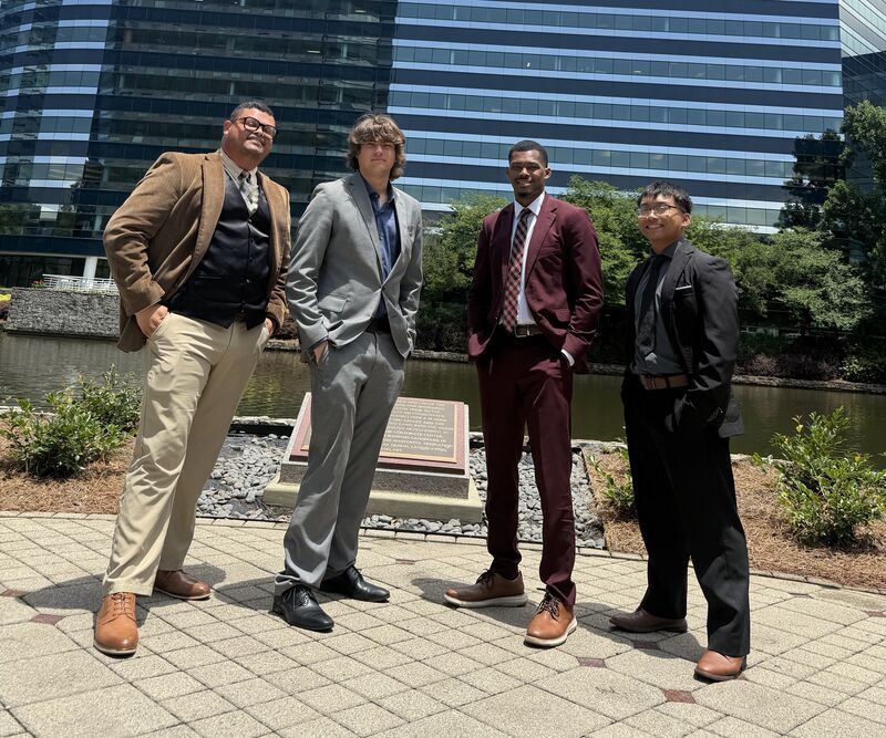The Noble Summit Management team outside their Camp Hill office